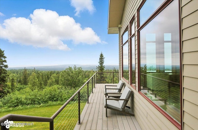 10500 Blackwolf Cir, Anchorage, AK 99507 - balcony featuring a view of trees