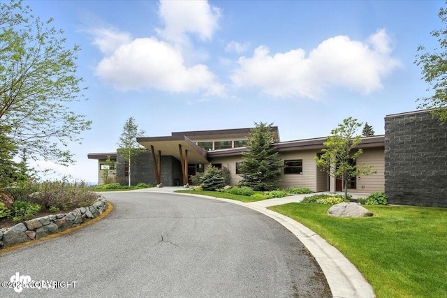 10500 Blackwolf Cir, Anchorage, AK 99507 - view of front of property featuring asphalt driveway and a front yard