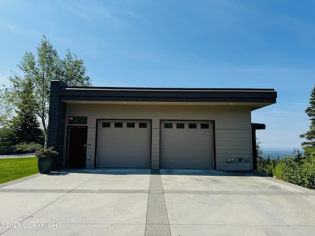 10500 Blackwolf Cir, Anchorage, AK 99507 - garage with concrete driveway
