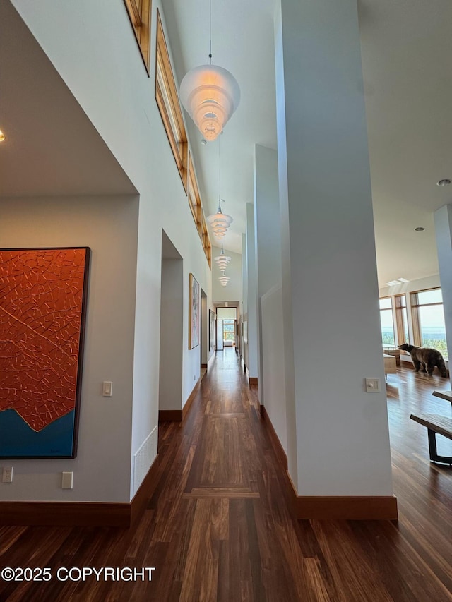 10500 Blackwolf Cir, Anchorage, AK 99507 - hallway with wood finished floors and a high ceiling