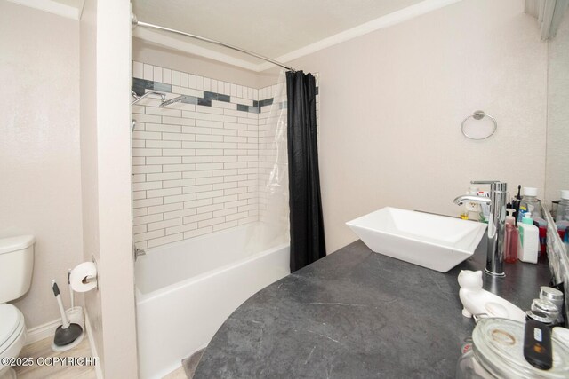 4530 Macalister Dr, Anchorage, AK 99502 - full bathroom with toilet, a sink, and shower / bath combo