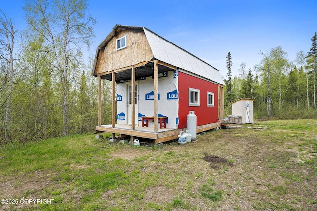 6360 Haystack Dr, Fairbanks, AK 99712 - back of property with metal roof and a gambrel roof