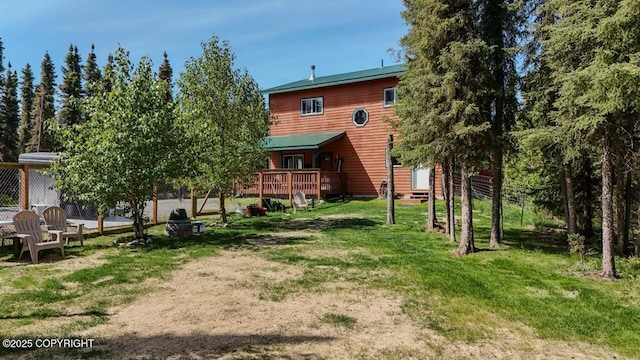 33426 Mid River Ave, Soldotna, AK 99669 - rear view of property with a yard and a wooden deck