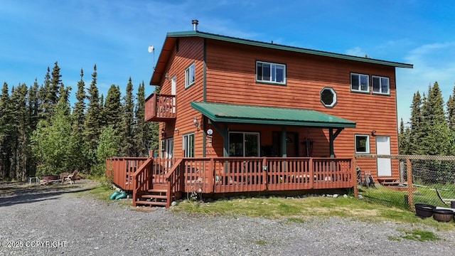 33426 Mid River Ave, Soldotna, AK 99669 - view of front of property with a balcony and a deck