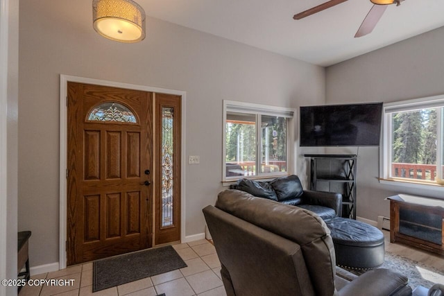 33426 Mid River Ave, Soldotna, AK 99669 - entrance foyer with plenty of natural light, ceiling fan, light tile patterned floors, and baseboard heating