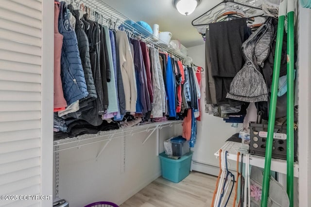 33426 Mid River Ave, Soldotna, AK 99669 - walk in closet featuring wood finished floors