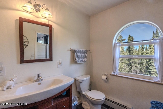 33426 Mid River Ave, Soldotna, AK 99669 - half bath featuring a baseboard heating unit and vanity