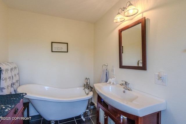 33426 Mid River Ave, Soldotna, AK 99669 - full bathroom with vanity, a freestanding tub, and tile patterned floors