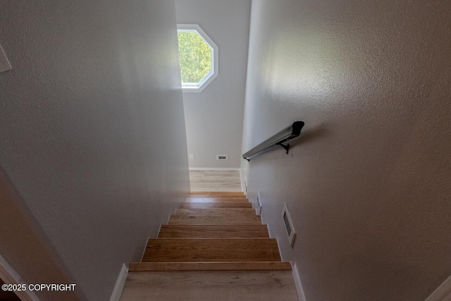 33426 Mid River Ave, Soldotna, AK 99669 - stairway with baseboards and wood finished floors
