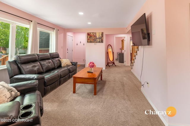 799 8th Ave, Fairbanks, AK 99701 - living room with light carpet, stairs, and recessed lighting