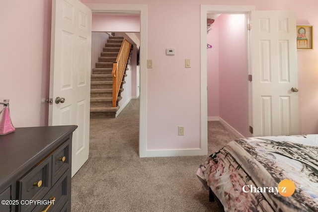799 8th Ave, Fairbanks, AK 99701 - carpeted bedroom featuring a spacious closet and baseboards