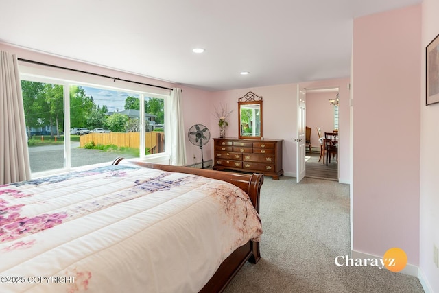 799 8th Ave, Fairbanks, AK 99701 - bedroom featuring access to outside, carpet, baseboard heating, baseboards, and recessed lighting