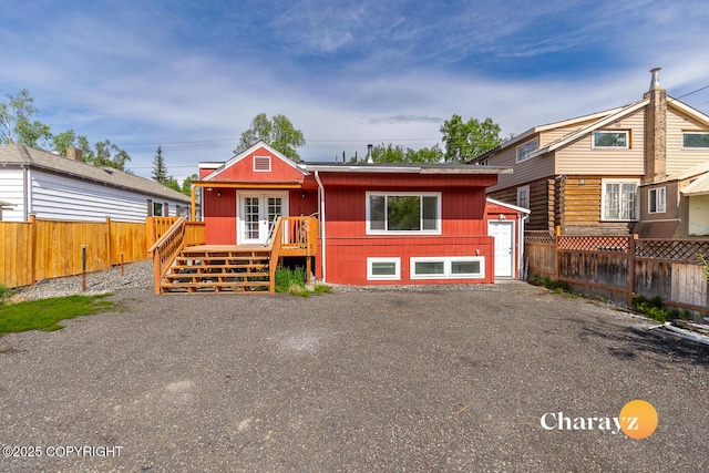 799 8th Ave, Fairbanks, AK 99701 - view of front of home with a deck and french doors