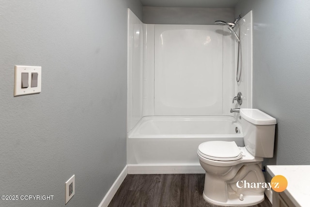 799 8th Ave, Fairbanks, AK 99701 - bathroom featuring wood finished floors, toilet, vanity, baseboards, and tub / shower combination