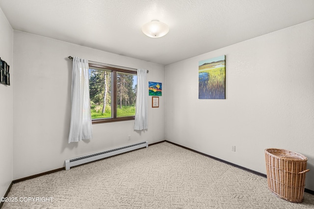 48160 Snowflake Ct, Soldotna, AK 99669 - spare room with a baseboard radiator and carpet