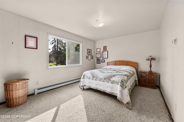 48160 Snowflake Ct, Soldotna, AK 99669 - bedroom with a baseboard heating unit and carpet