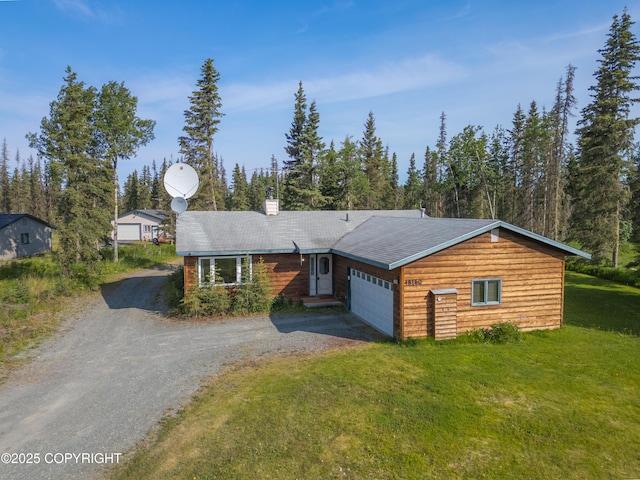 48160 Snowflake Ct, Soldotna, AK 99669 - view of front of home featuring dirt driveway, a front yard, a garage, and a chimney