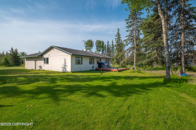 48160 Snowflake Ct, Soldotna, AK 99669 - view of grassy yard with a wooden deck
