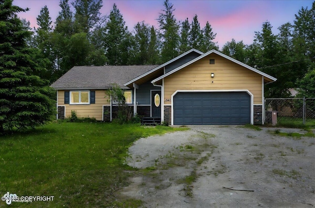 1940 E Caribou Loop, Wasilla, AK 99654 - ranch-style home featuring stone siding, driveway, and a garage