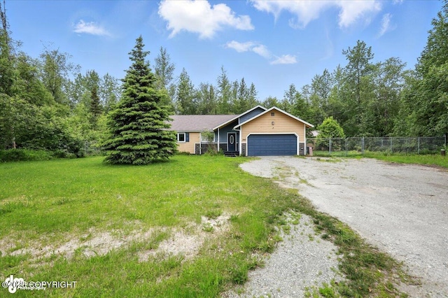 1940 E Caribou Loop, Wasilla, AK 99654 - single story home featuring a garage and dirt driveway