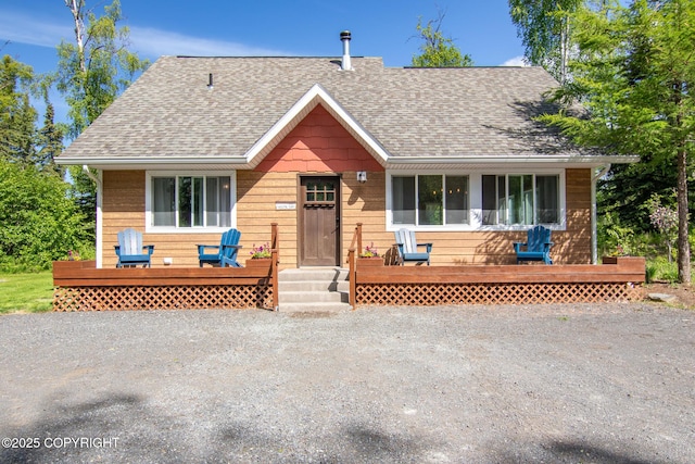 41167 Witman Ct, Soldotna, AK 99669 - view of front of home featuring a deck and roof with shingles