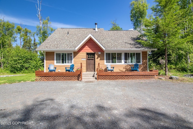 41167 Witman Ct, Soldotna, AK 99669 - view of front of home with roof with shingles and a deck