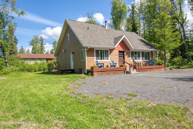 41167 Witman Ct, Soldotna, AK 99669 - view of front of house with a shingled roof and a front yard