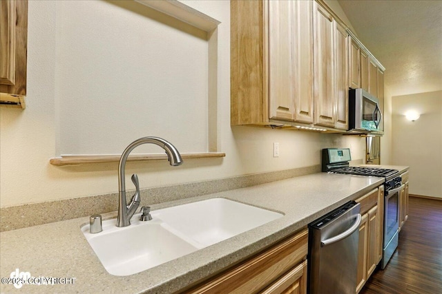 3963 N Coronado St, Wasilla, AK 99623 - kitchen featuring appliances with stainless steel finishes and dark wood-type flooring