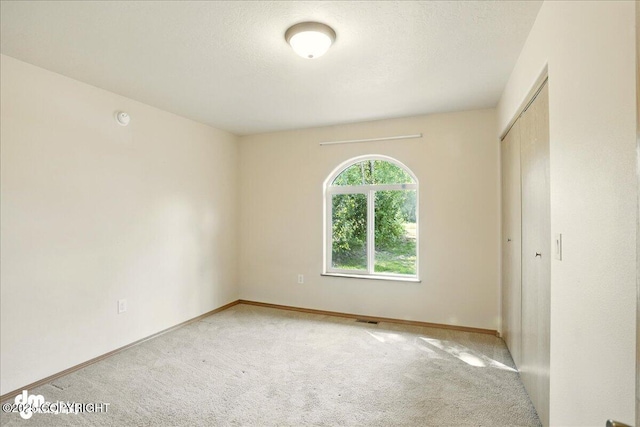 3963 N Coronado St, Wasilla, AK 99623 - spare room featuring carpet