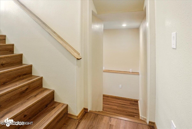 3963 N Coronado St, Wasilla, AK 99623 - stairs featuring wood finished floors and recessed lighting