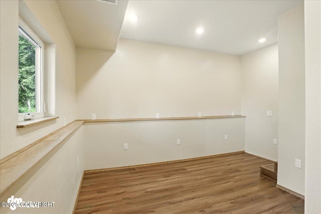 3963 N Coronado St, Wasilla, AK 99623 - unfurnished room with wood finished floors and recessed lighting