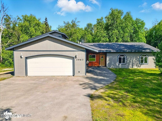 3963 N Coronado St, Wasilla, AK 99623 - single story home featuring an attached garage, a front yard, and asphalt driveway