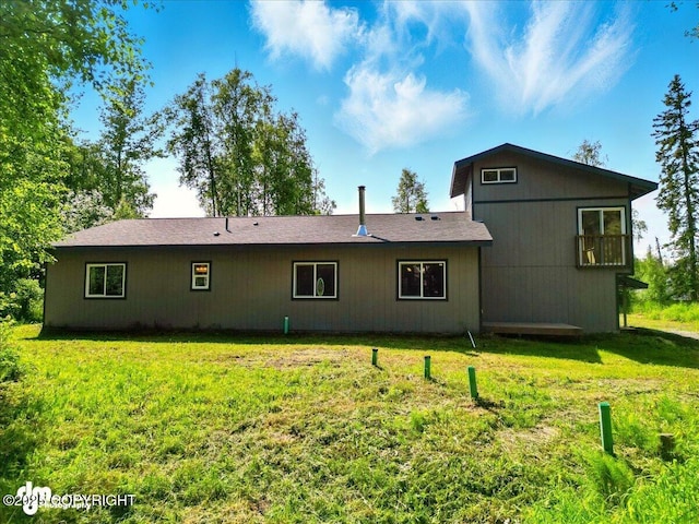 3963 N Coronado St, Wasilla, AK 99623 - back of house featuring a yard