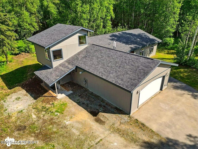 3963 N Coronado St, Wasilla, AK 99623 - aerial view of property and surrounding area featuring a heavily wooded area