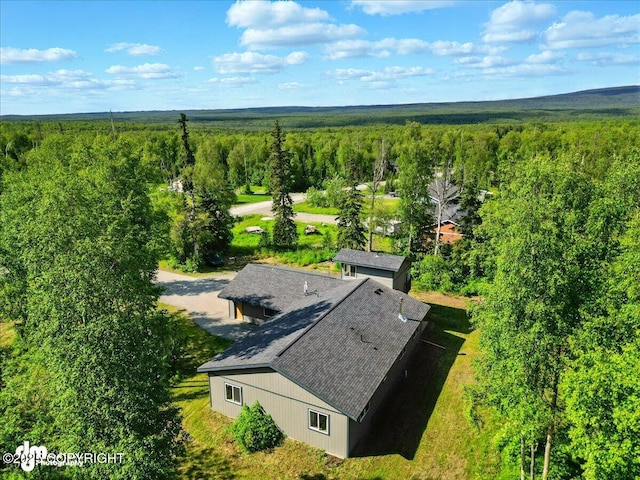 3963 N Coronado St, Wasilla, AK 99623 - aerial view of property and surrounding area with a heavily wooded area