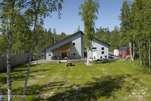 6961 S Hangar Talk Cir, Wasilla, AK 99623 - rear view of house with a shed