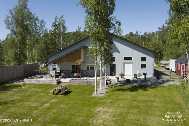 6961 S Hangar Talk Cir, Wasilla, AK 99623 - back of property featuring a patio