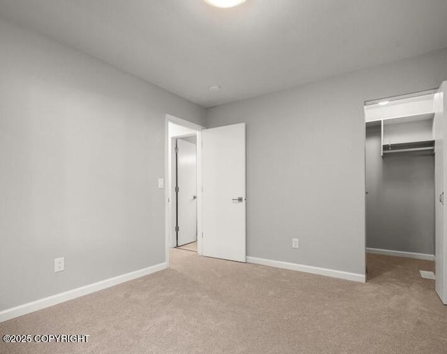 2551 Lahonda Dr, Anchorage, AK 99517 - unfurnished bedroom featuring carpet flooring and baseboards