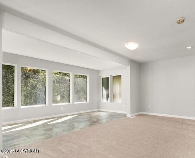 2551 Lahonda Dr, Anchorage, AK 99517 - spare room featuring baseboards, carpet floors, and a smoke detector