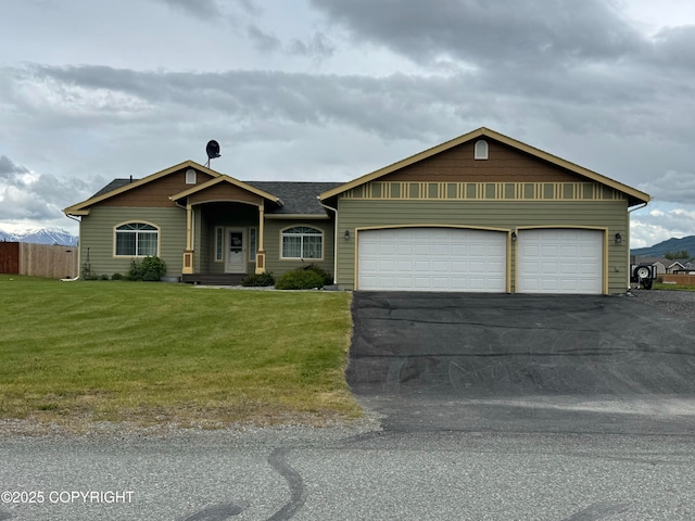 423 S Conestoga Loop, Palmer, AK 99645 - ranch-style house with driveway and a garage