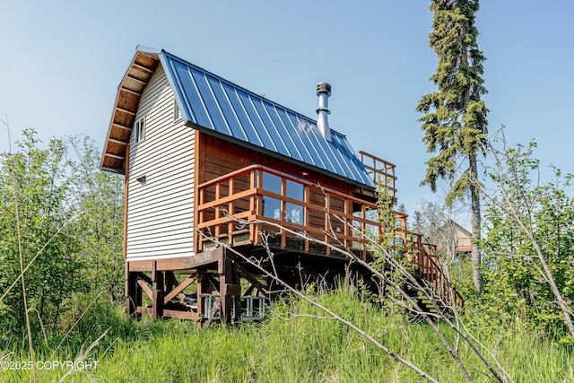 45638 Back Troll, Kenai, AK 99611 - rear view of house with a metal roof, a gambrel roof, a standing seam roof, and a deck