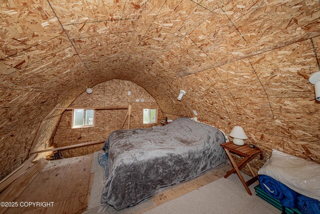 45638 Back Troll, Kenai, AK 99611 - bedroom with lofted ceiling and wood finished floors