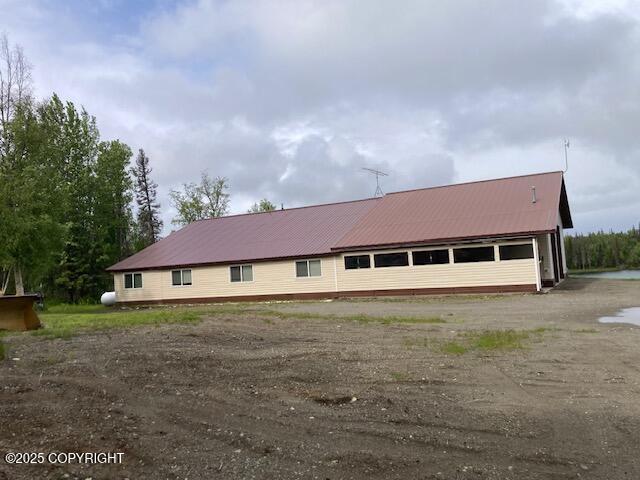 50470 Maranatha Ln, Nikiski/North Kenai, AK 99611 - back of house with a metal roof