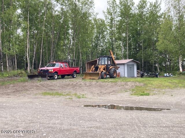 50470 Maranatha Ln, Nikiski/North Kenai, AK 99611 - view of yard with a storage unit