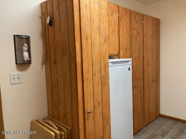 50470 Maranatha Ln, Nikiski/North Kenai, AK 99611 - detailed view of fridge and wood finished floors