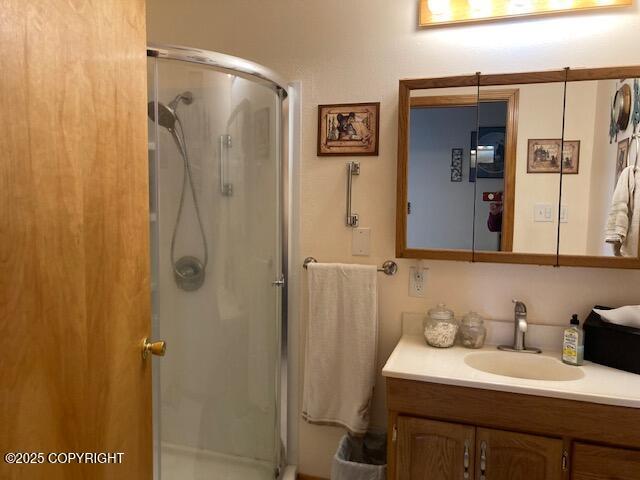 50470 Maranatha Ln, Nikiski/North Kenai, AK 99611 - bathroom with vanity and a stall shower