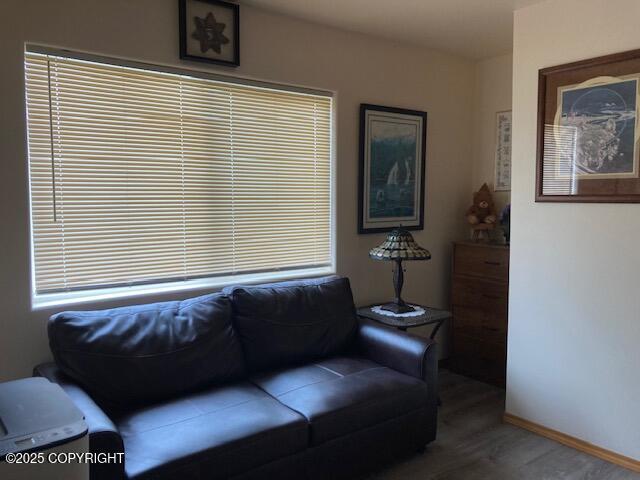 50470 Maranatha Ln, Nikiski/North Kenai, AK 99611 - living room featuring baseboards and wood finished floors