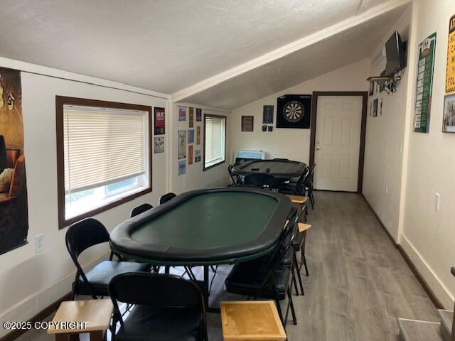 50470 Maranatha Ln, Nikiski/North Kenai, AK 99611 - playroom featuring lofted ceiling and light wood-style flooring