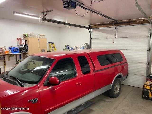 50470 Maranatha Ln, Nikiski/North Kenai, AK 99611 - garage with a garage door opener