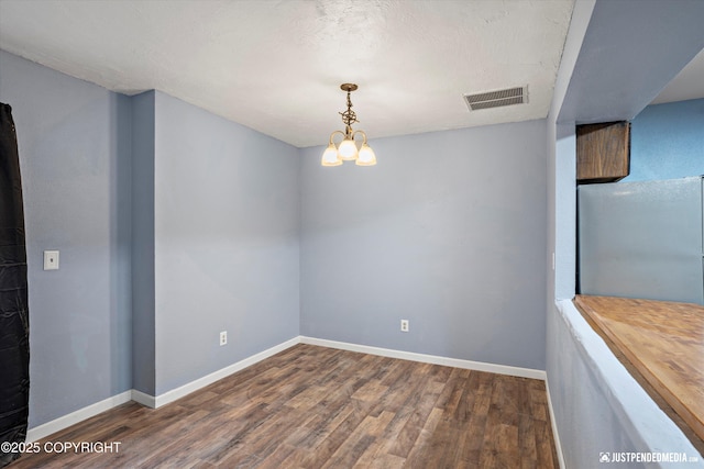1711 Russian Jack Dr # B4, Anchorage, AK 99508 - unfurnished dining area featuring wood finished floors